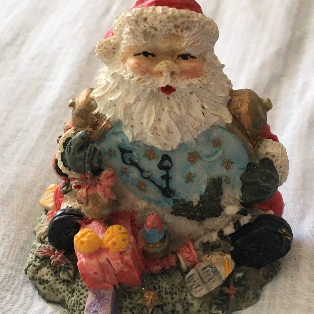 Charming Santa Claus Holiday Figurine with Red and Gold Accents